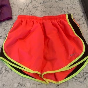 Bright pink/yellow Nike shorts